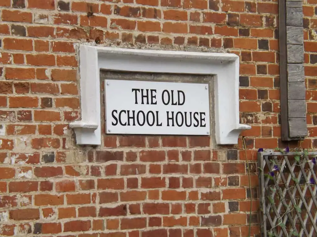 Serious Curb Appeal brick front exterior of the old schoolhouse