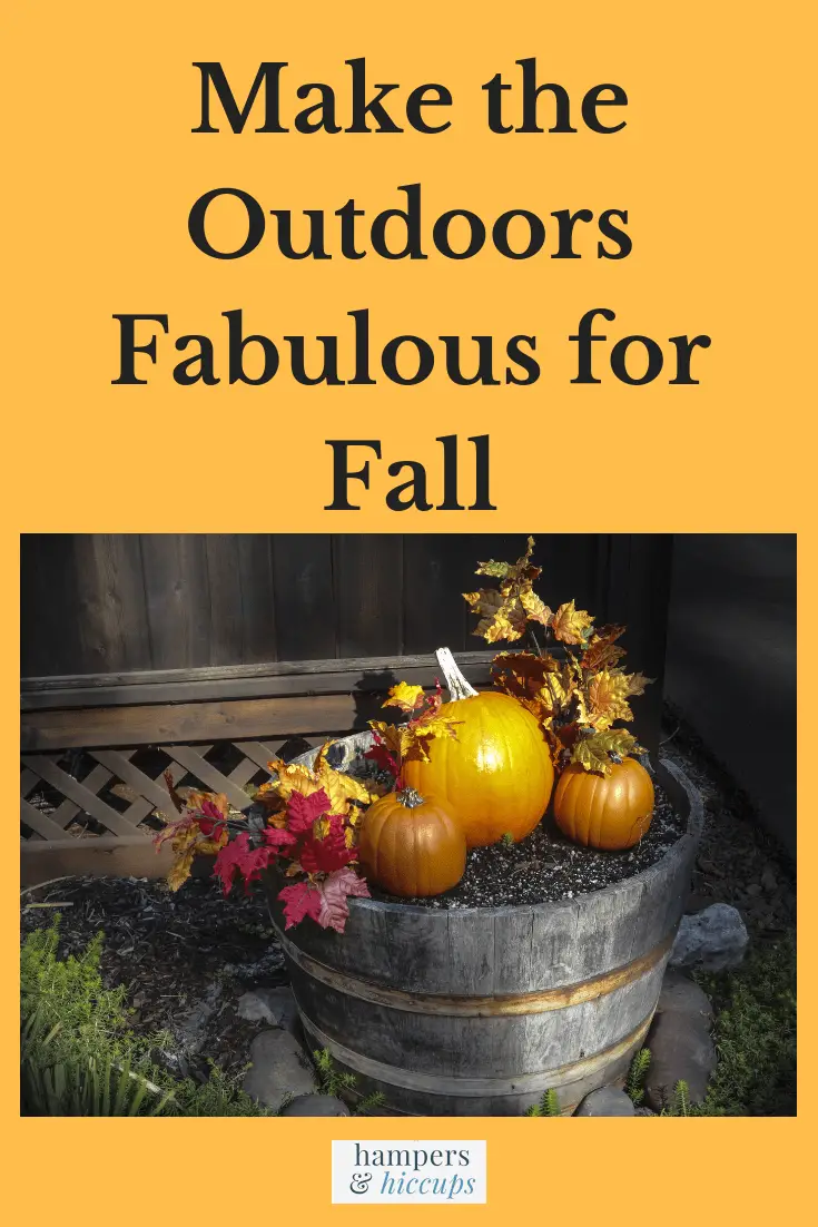 Make the Outdoors Fabulous for Fall image wooden barrel of pumpkin decor near porch hampersandhiccups