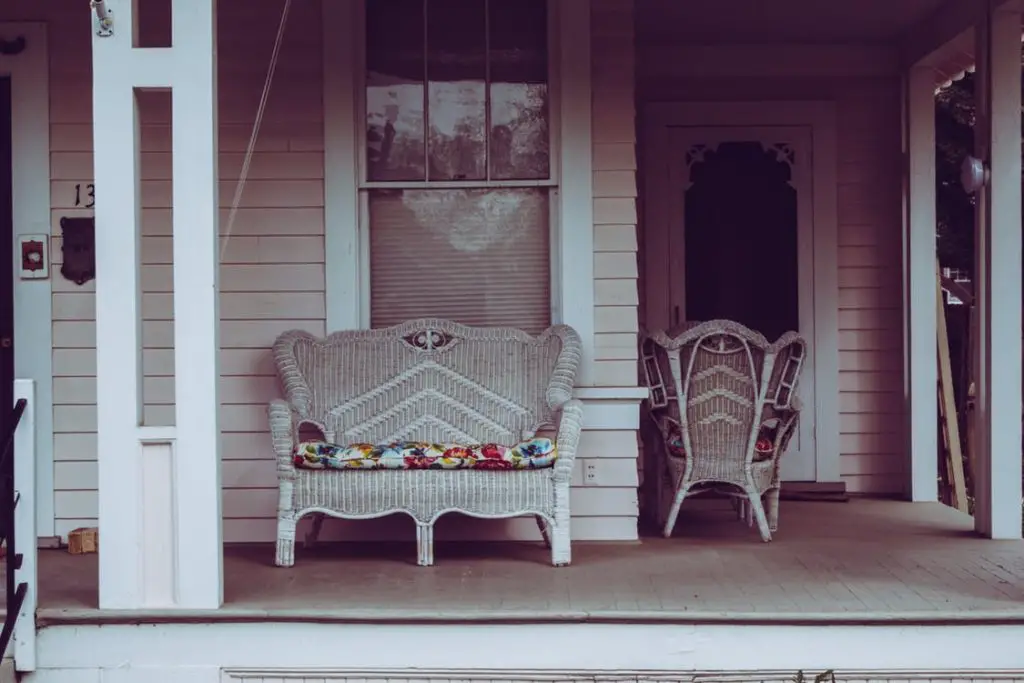 Home front exterior makeover front porch of home with wicker furniture